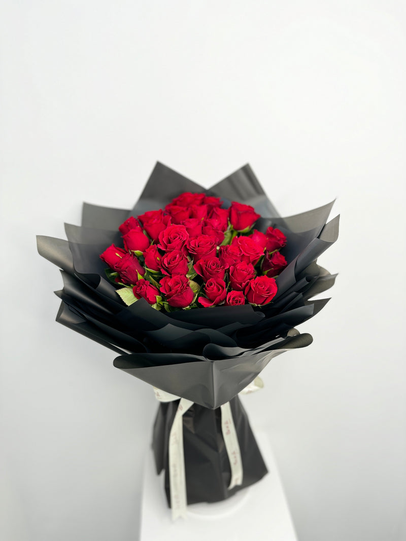 31 Red Roses in Black